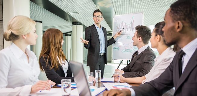 Businessman explaining his business ideas to his teamates during a business meeting.